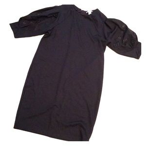 Tunic style dress with embroidered sleeve